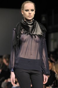 Noir's Afghan scarf in leather. Not so much creativity in terms of design. Good concept in terms of modern trend vs a classic material though.